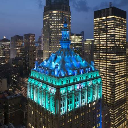 skyline view of the Helmsley building at night